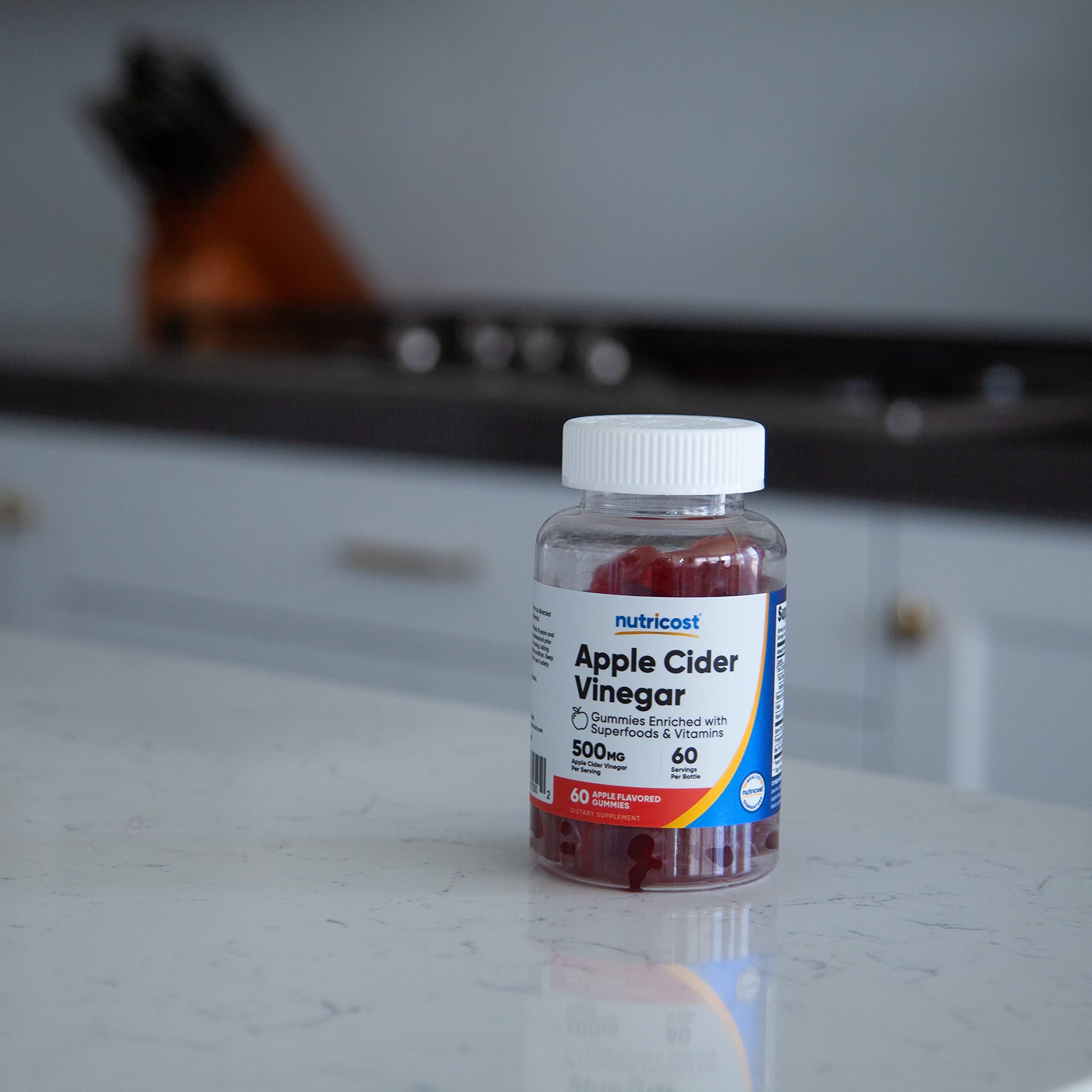 Nutricost Apple Cider Vinegar Gummies on shelf with gluten-free and Non-GMO cues.