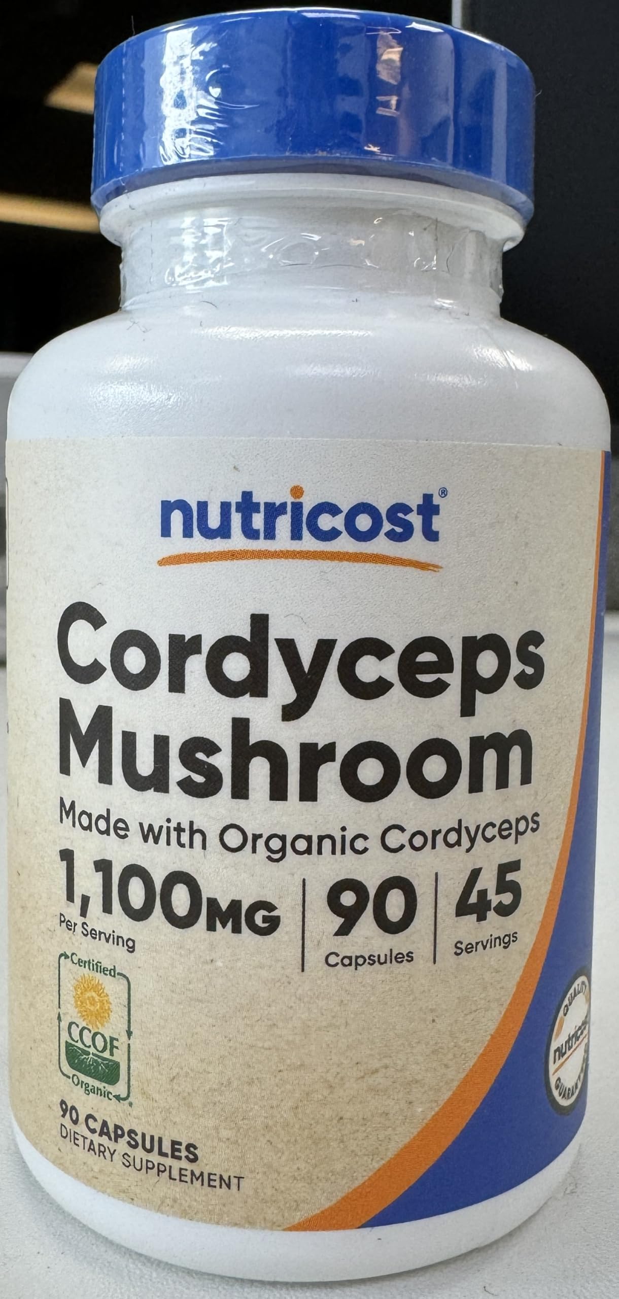 Nutricost Cordyceps capsules close-up reveals capsule texture and size.