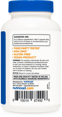 Nutricost Mushroom Complex pouring capsules into hand for daily use.