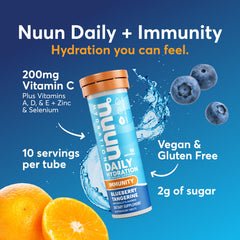 Nuun Immunity tablet dissolving in water for a fizzy, on-the-go drink.