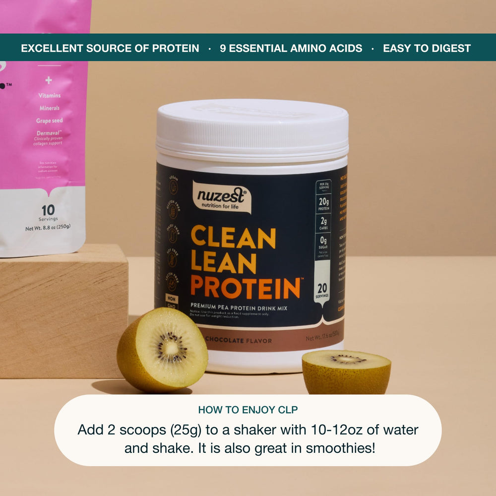 Nuzest measuring spoon beside shake bottle for precise protein portions
