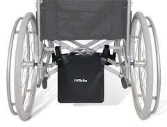 NYOrtho Urine Drainage Bag Holder attached discreetly to a wheelchair for privacy and accessibility.
