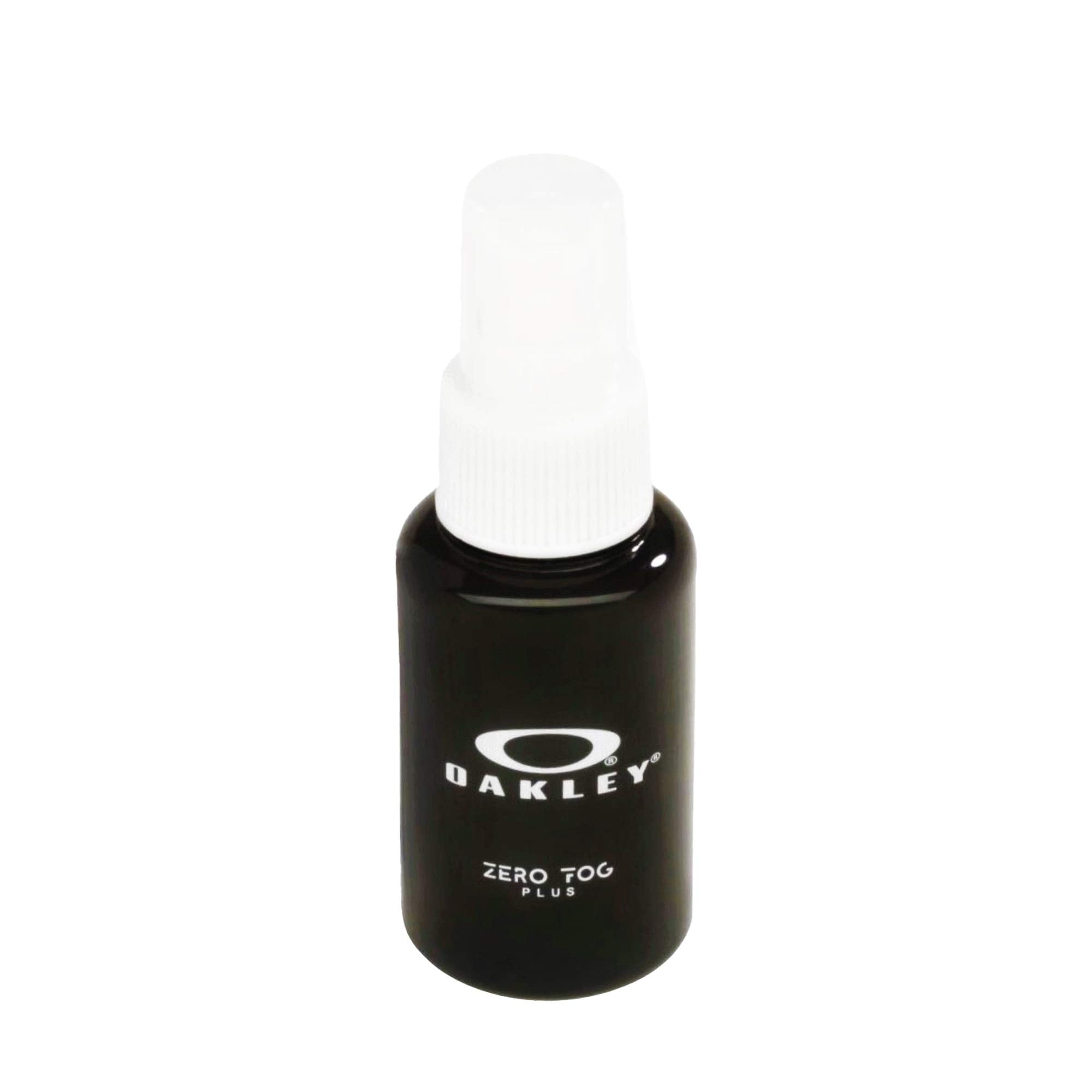 Oakley Liquid OO Zero Fog 60ml bottle applying anti-fog solution to eyewear lens for clearer vision
