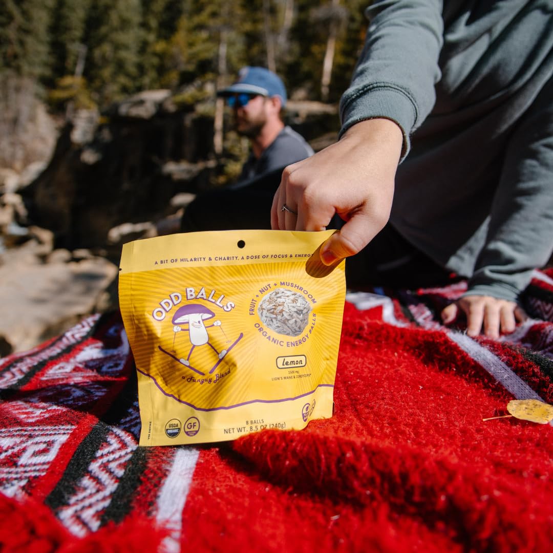 ODD BALLS Lemon energy ball vegan-label close-up emphasizing plant-based snacking.