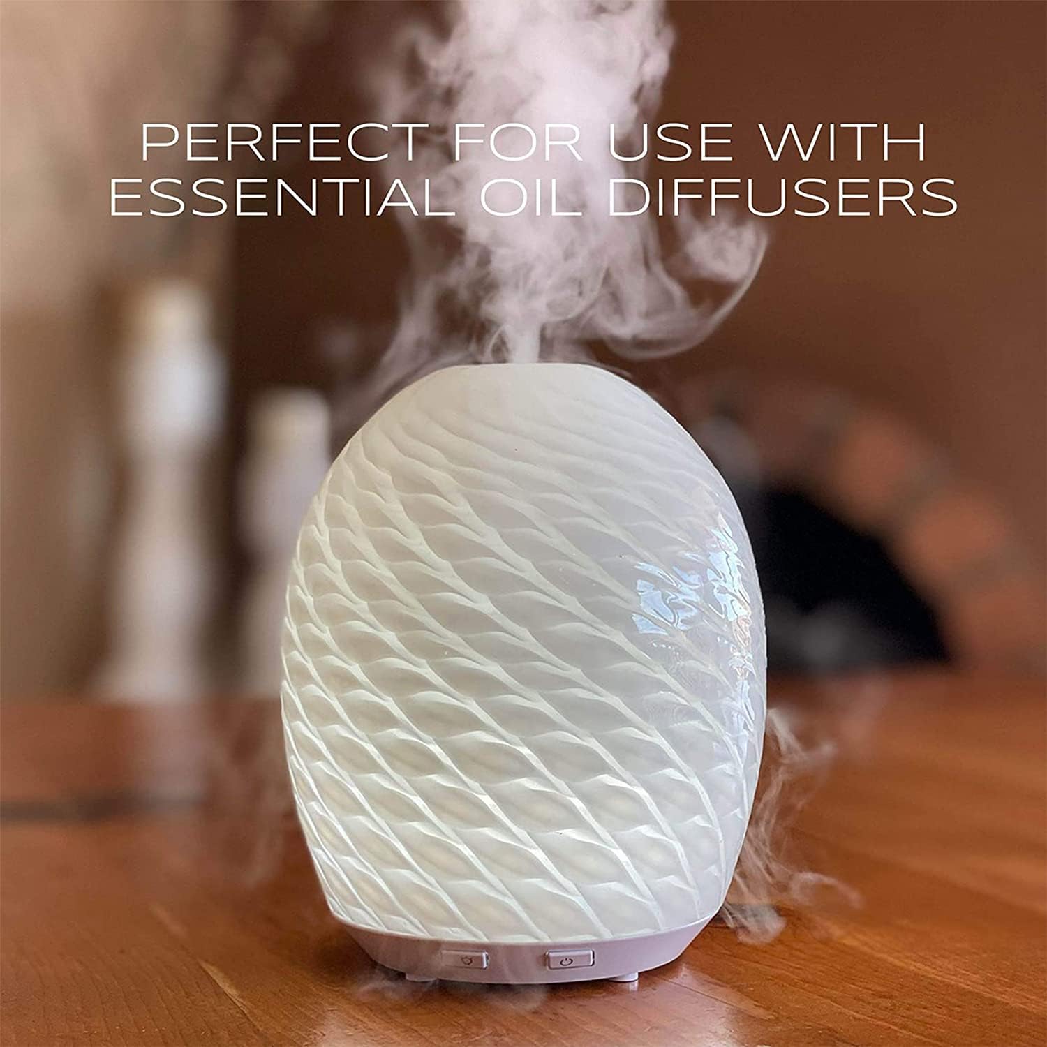 Ola Prima rosemary essential oil crafted into lotions or bath products for spa-like care.