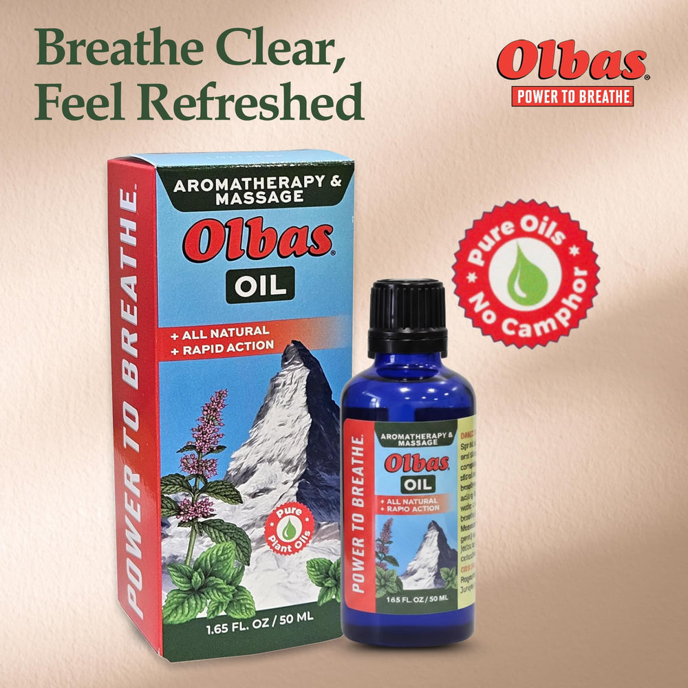 Olbas massage oil hand-application close-up showing gentle rub