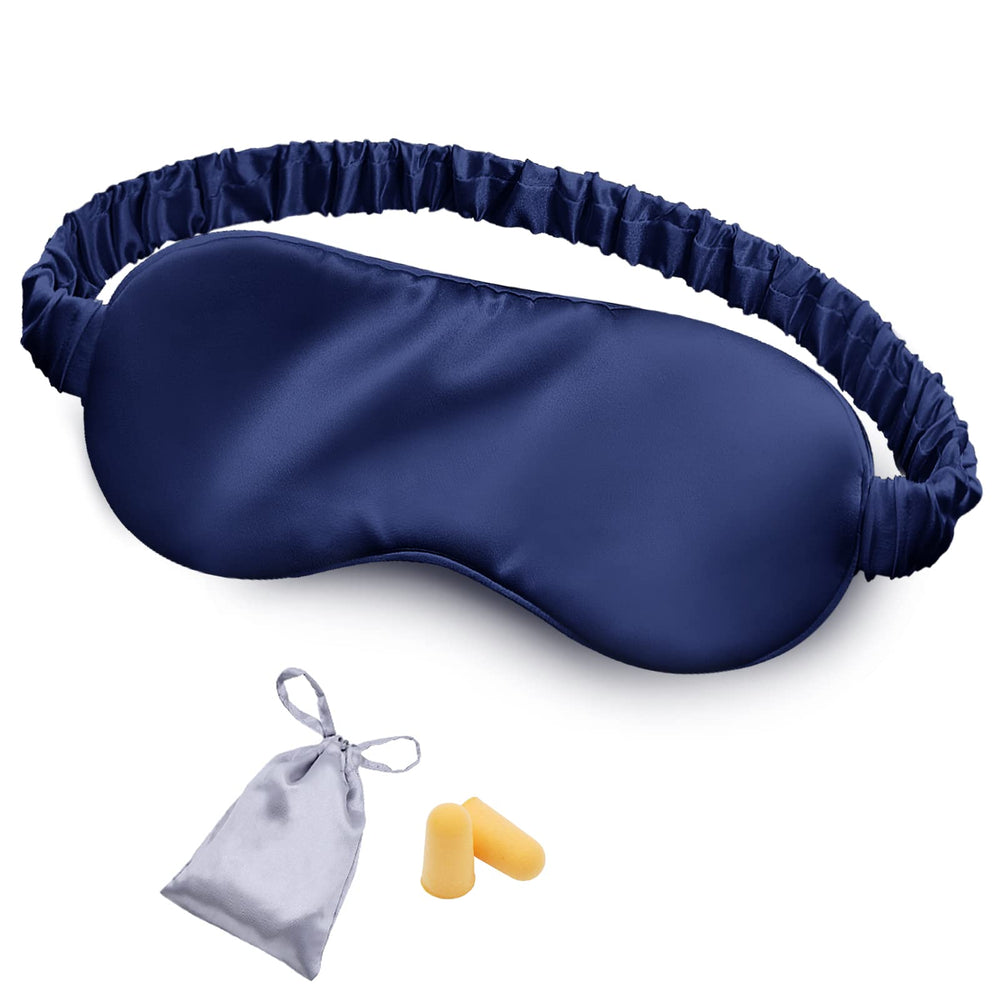 OLESILK silk sleep mask in navy blue worn for deep, undisturbed rest
