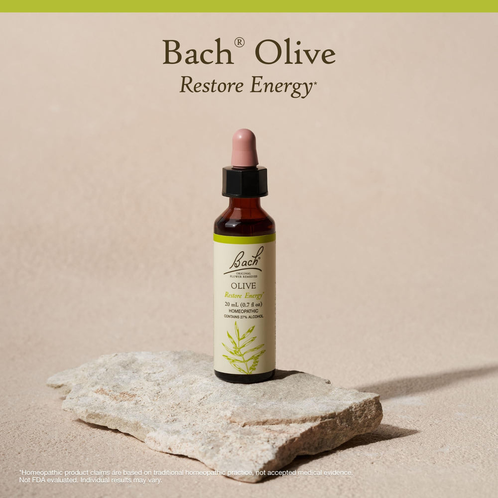 Olive drops added to water for subtle mood support