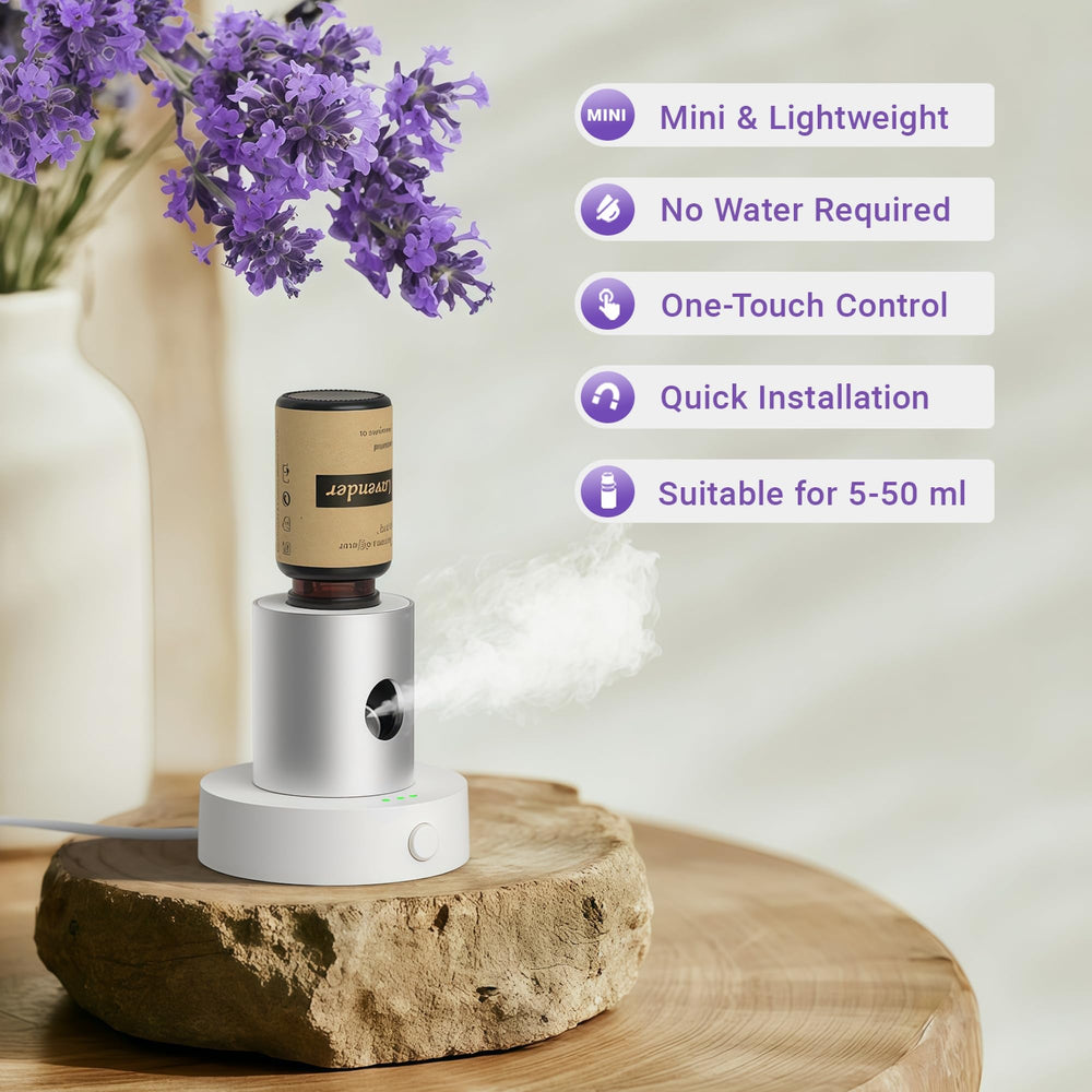 Olxasw diffuser connected by USB-C enabling stable scenting on desk or nightstand.