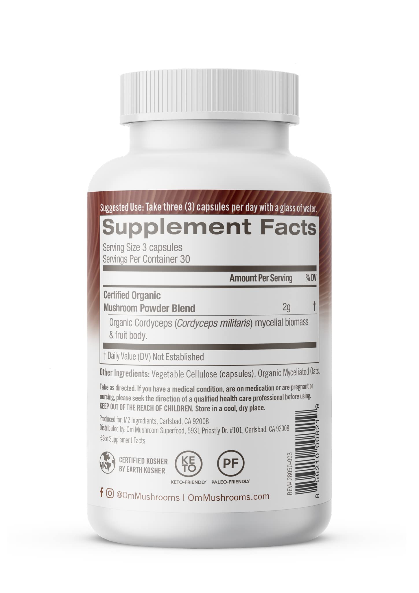 OM MUSHROOM capsules showing full-spectrum extract with natural color.