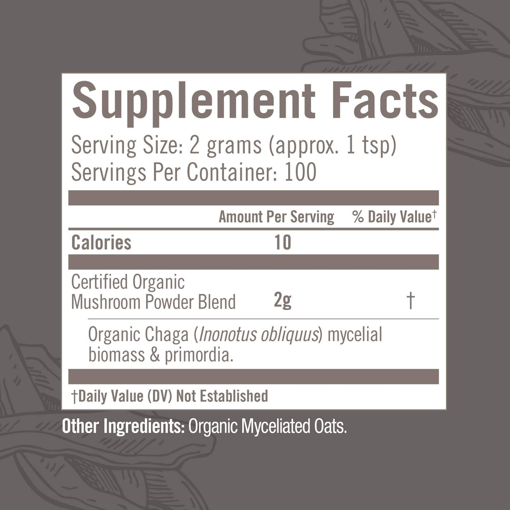 Scoop of OM MUSHROOM SUPERFOOD Chaga powder for daily use