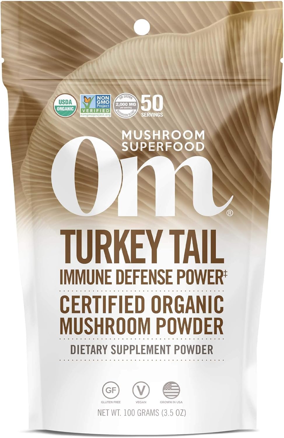 OM Mushroom Superfood Turkey Tail powder in bag closeup for organic immune support.