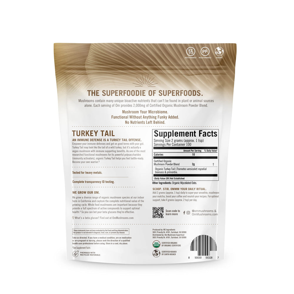 OM Mushroom Superfood Turkey Tail powder in smoothie for gut health.