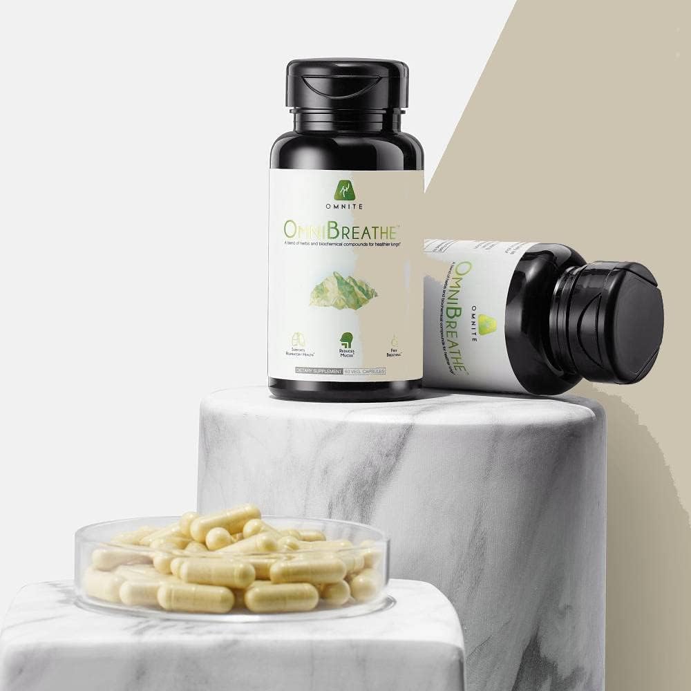 Omnite bottle on table suggesting everyday lung health ritual.