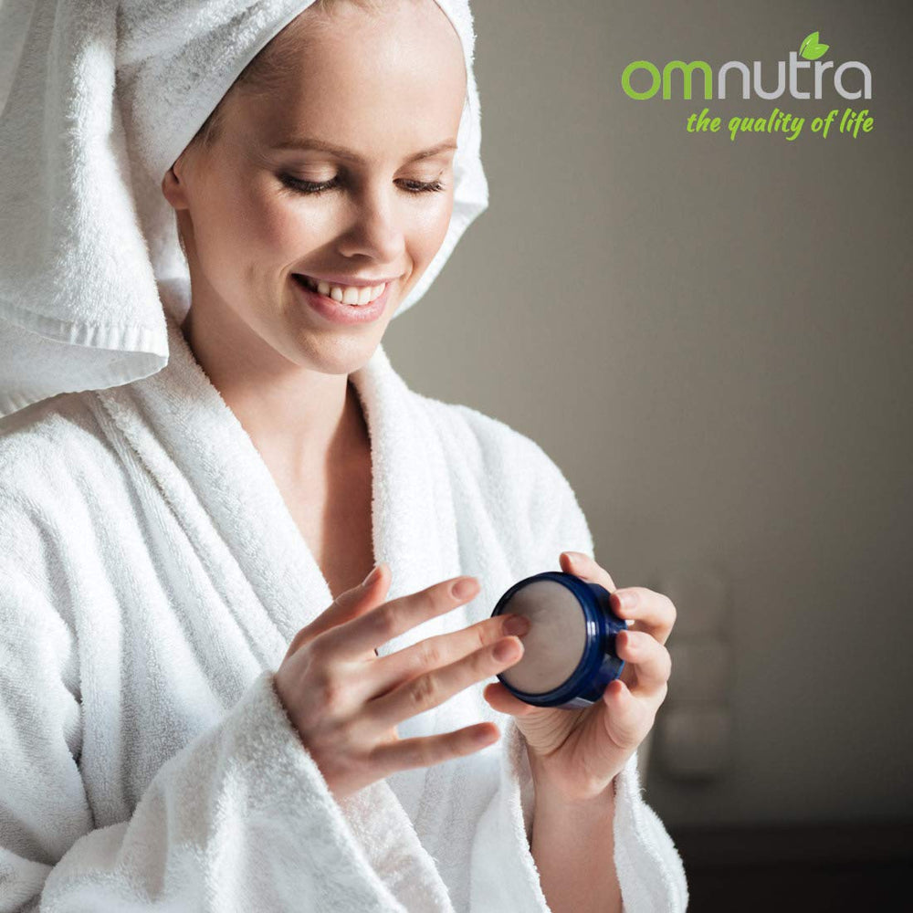 OmNutra DMSO cream packaging design signals premium care and skin nourishment.