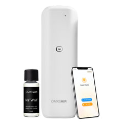OMXSair waterless wall plug diffuser plugged into outlet, delivering room fragrance.