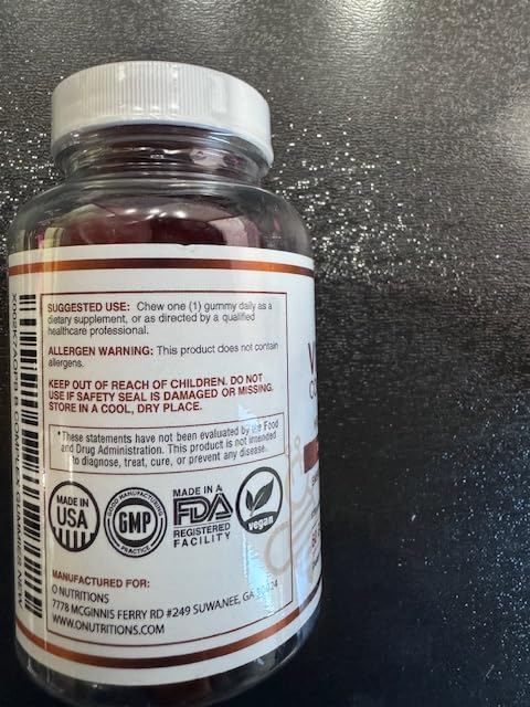 Close-up of O NUTRITIONS B12 and Biotin gummies in bright colors