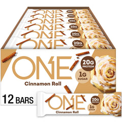 ONE Cinnamon Roll bar packaging highlights gluten-free protein snack.