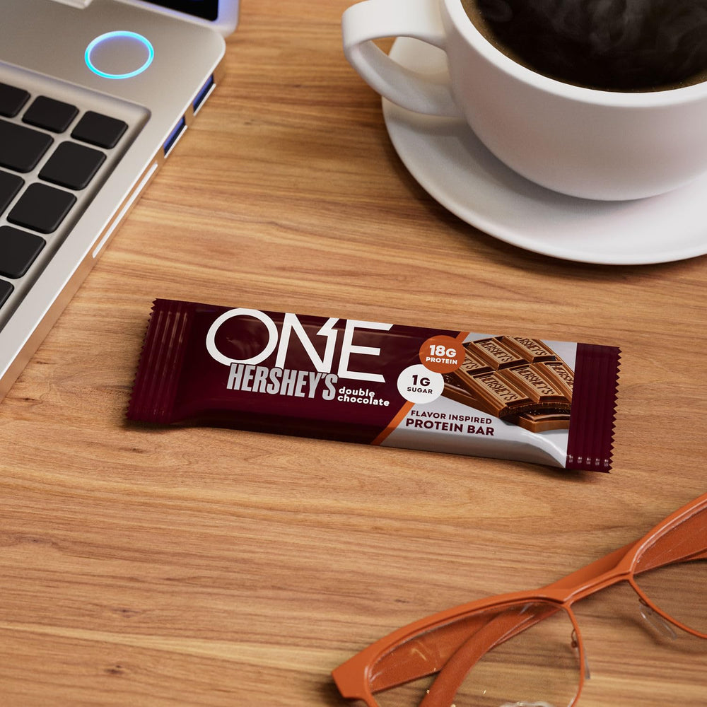 ONE Protein Bar Hershey's Double Chocolate on office desk for mid-day energy