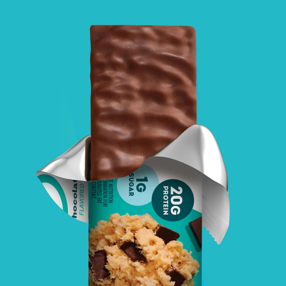 Bar in hand ready for a quick, satisfying snack.