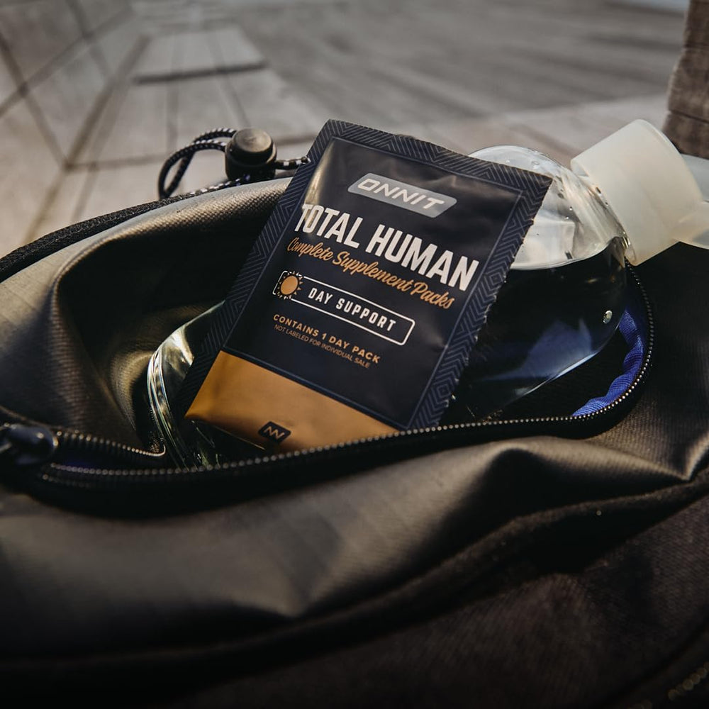 ONNIT Total Human vitamin packs presented for easy daily use.