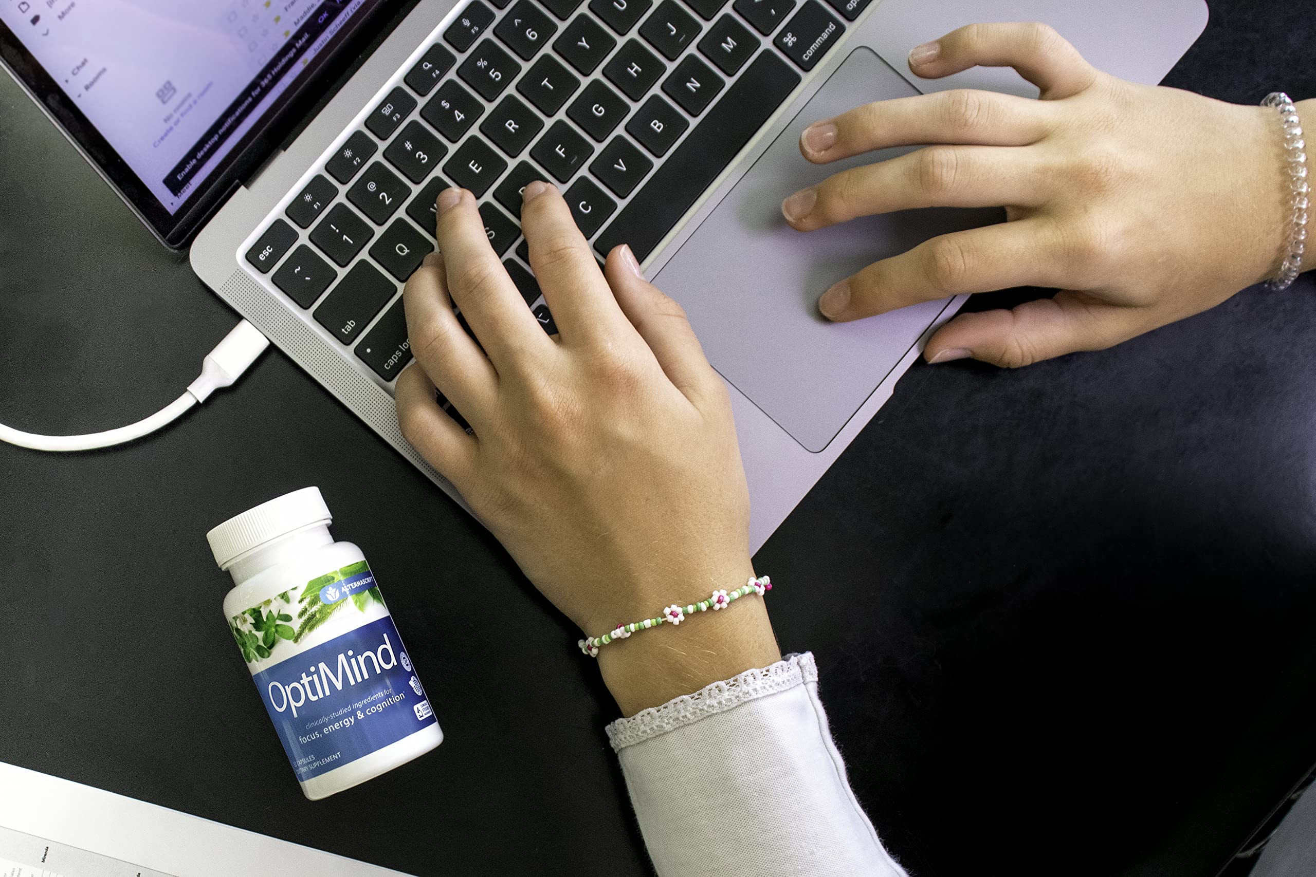 Optimind box in lifestyle shot for everyday cognitive support.
