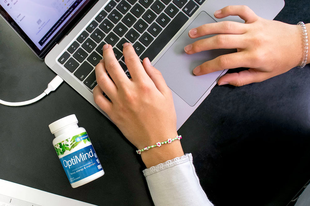 Optimind box in lifestyle shot for everyday cognitive support.