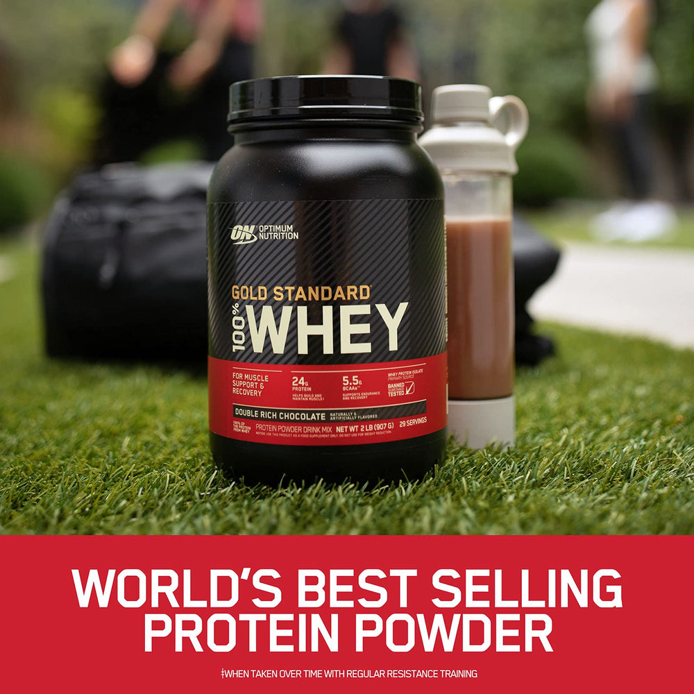 Optimum Nutrition scoop pouring into mixer for easy mix.
