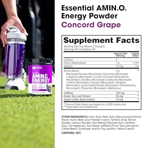 Optimum Nutrition Amino Energy shaker set beside a laptop for focus
