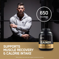 Optimum Nutrition scoop beside tub highlights protein and calories for gains.