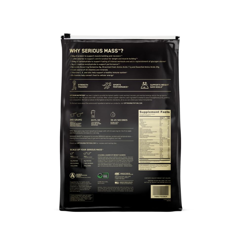 Optimum Nutrition Serious Mass vanilla spoon beside glass ready shake