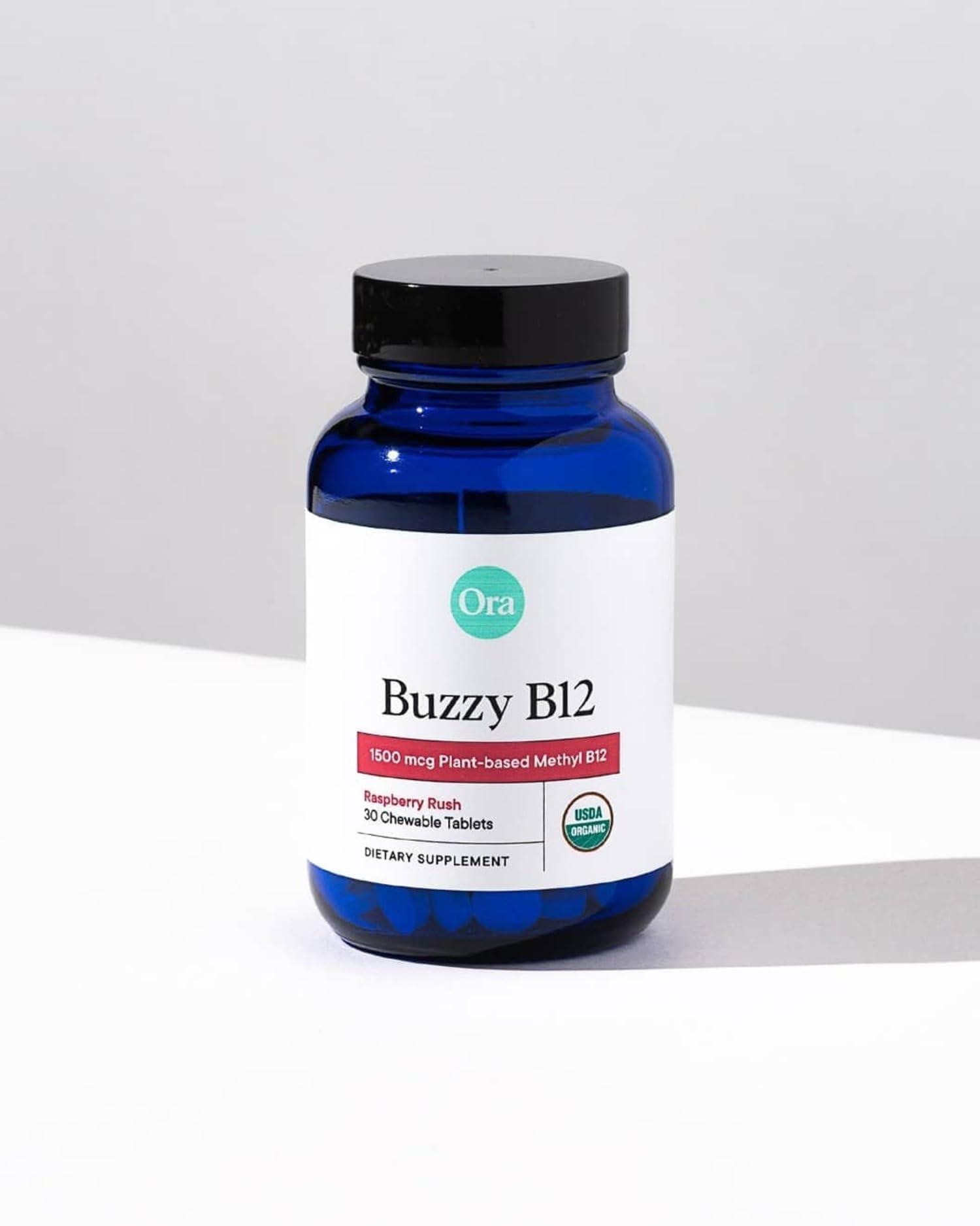 Compact Ora Organic B12 bottle for daily on-the-go energy.