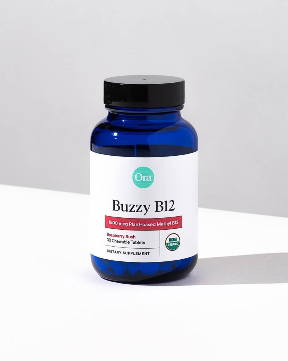 Compact Ora Organic B12 bottle for daily on-the-go energy.