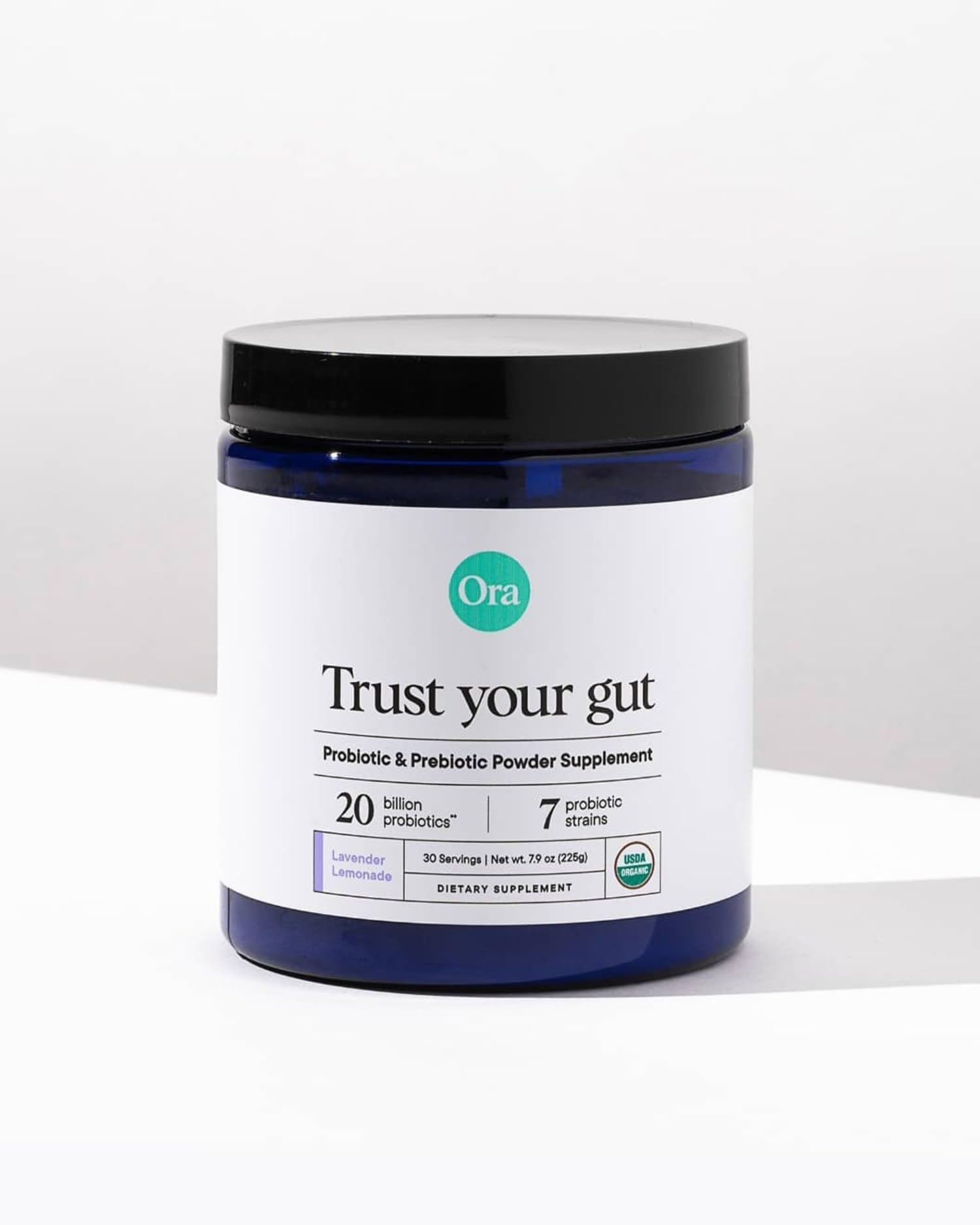 Ora Organic daily-digestive-support powder shown with water, supporting easy daily use.