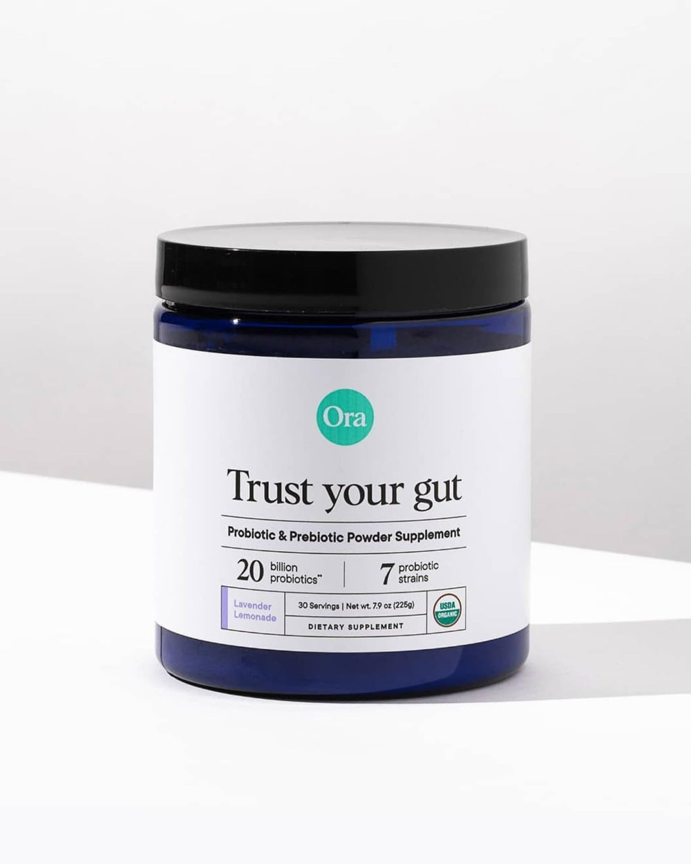 Ora Organic daily-digestive-support powder shown with water, supporting easy daily use.