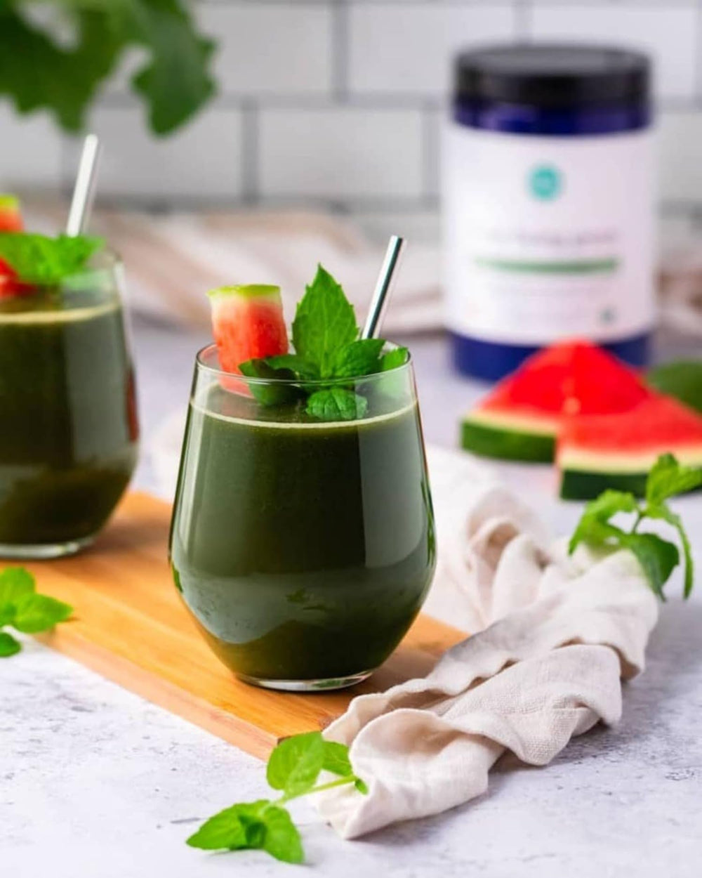 Ora Organic Greens Powder citrus flavor close-up inviting a refreshing taste.