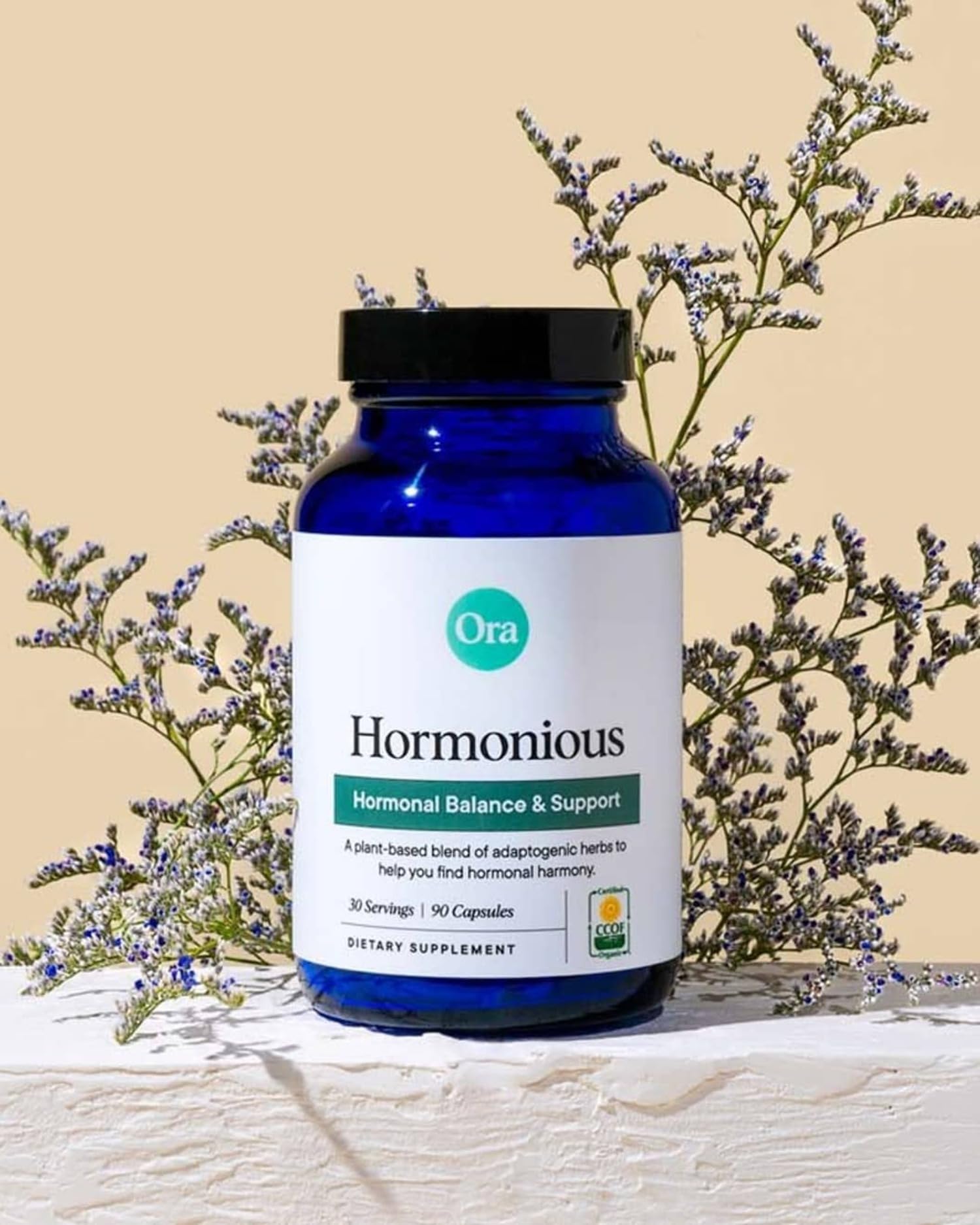 Ora Organic Hormone Balance bottle pour showing simple, daily routine usage