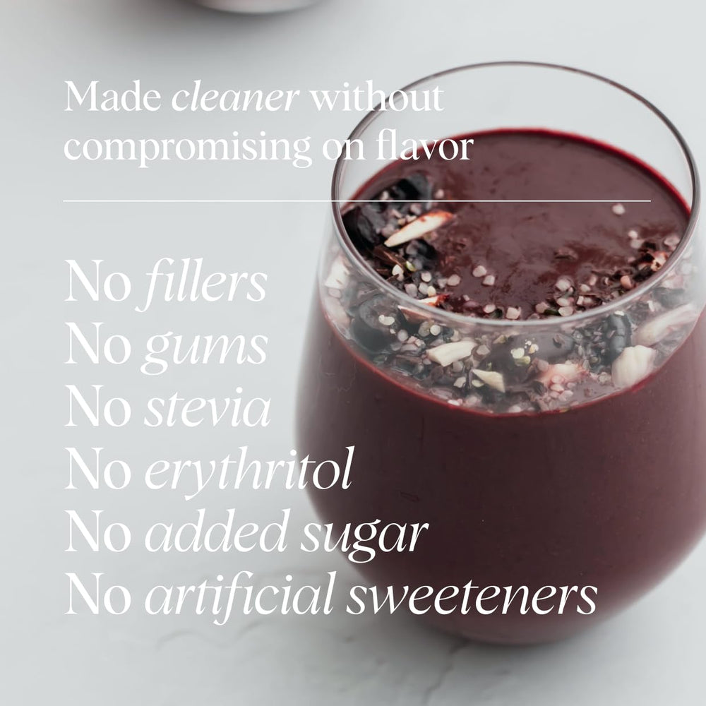 Ora Organic shake with chocolate powder demonstrates smooth texture and easy mixing.