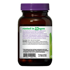 Oregon's Wild Harvest turmeric-curcumin capsules on white background for absorption emphasis.