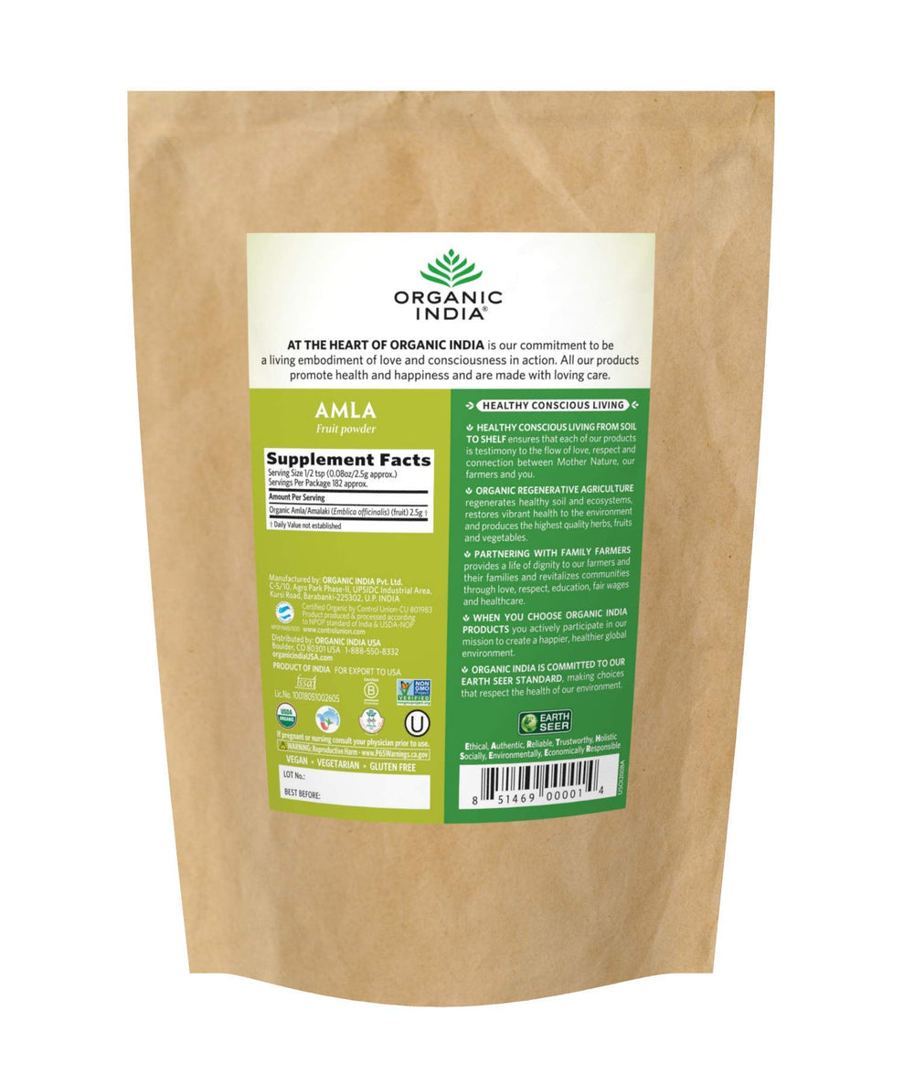 Organic India Amla powder bottle with scoop for easy daily supplementation and convenient dosing.