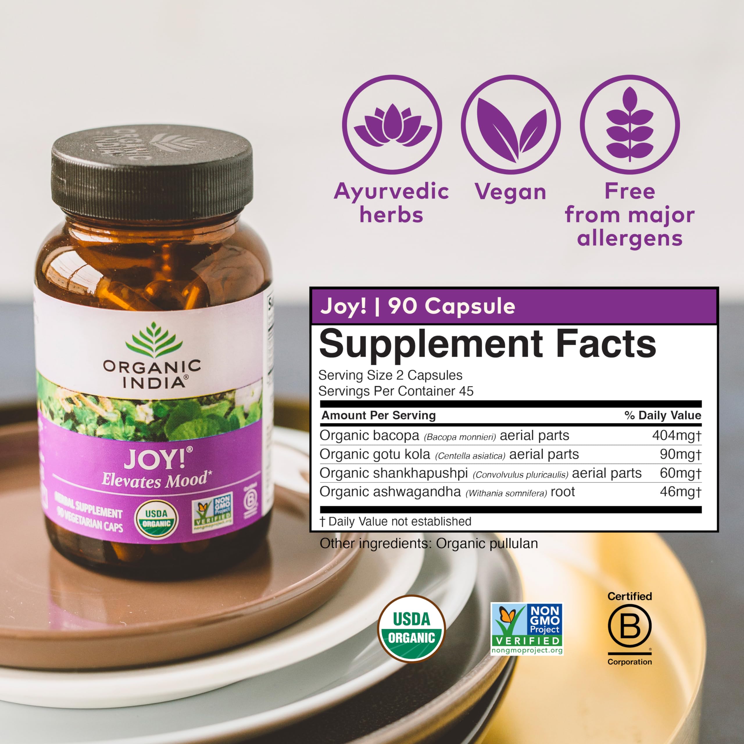 Organic India Joy packaging seal highlighting Kosher status and quality standards.