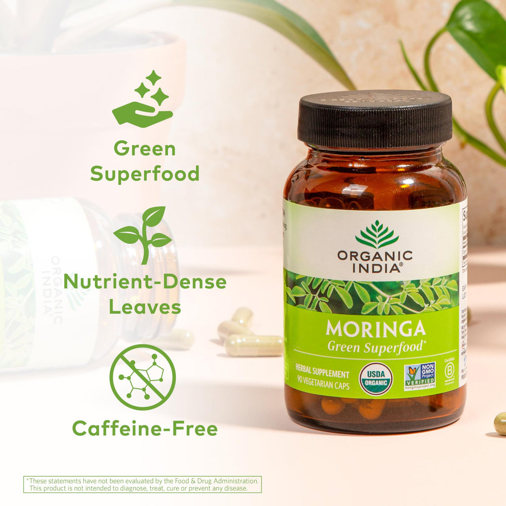 Organic India Moringa capsules closeup shows nutrient-dense plant protein support.