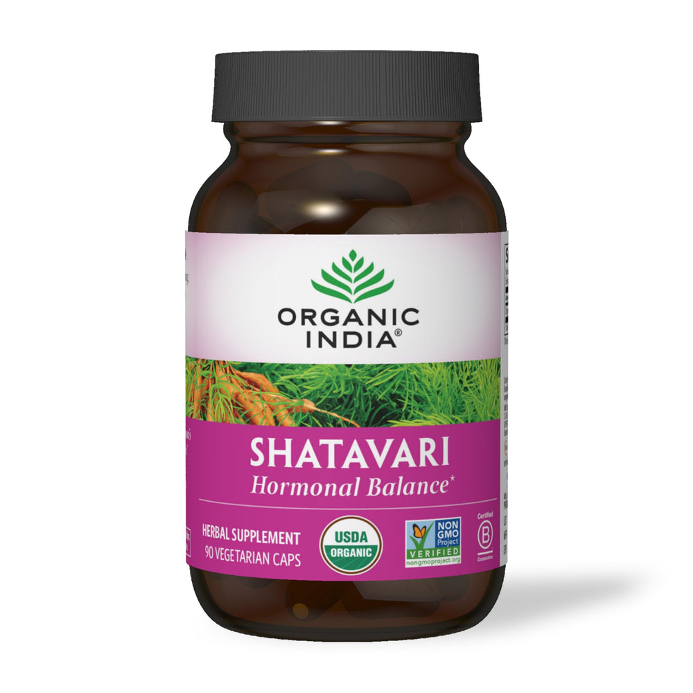 Organic India Shatavari package in hand reflects quality for hormone balance and reproductive support.