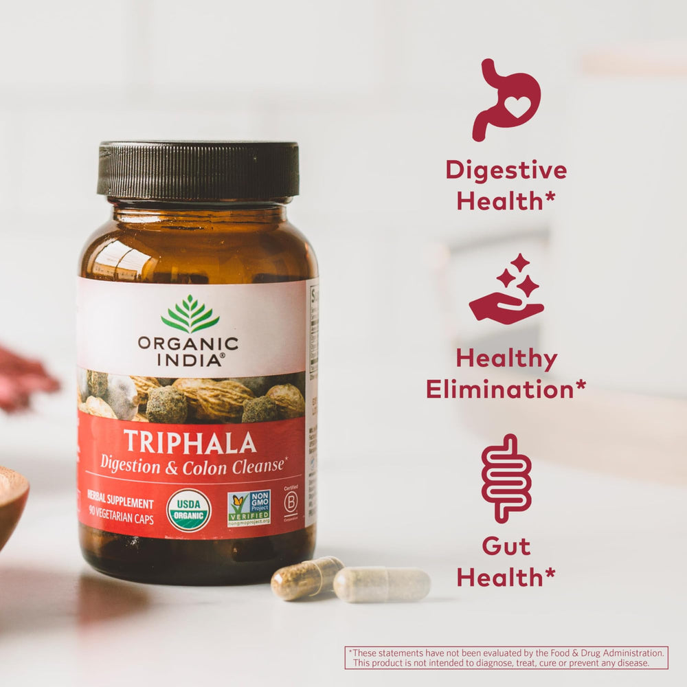 Organic India Triphala capsules ready for daily wellness routine, supports natural digestion.