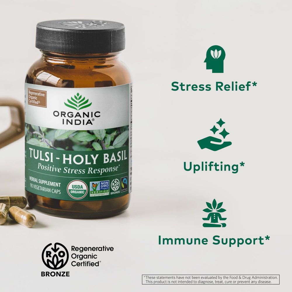 Organic India Tulsi capsules close-up showing vegetarian capsules.