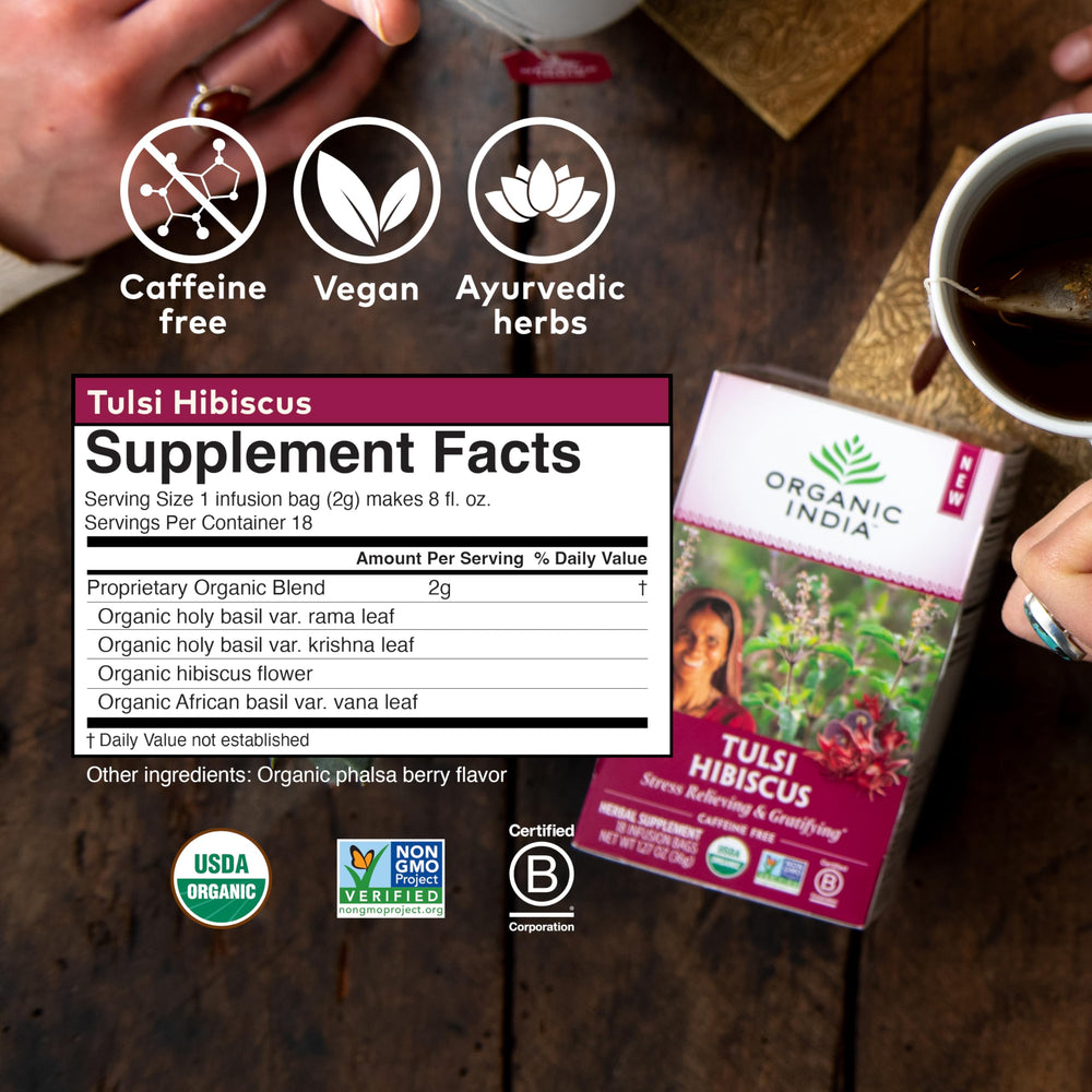 Steam rises from a cup highlighting caffeine-free relaxation with Tulsi Hibiscus blend.