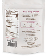 Organic Traditions Amla powder in a glass bowl with tangy aroma.
