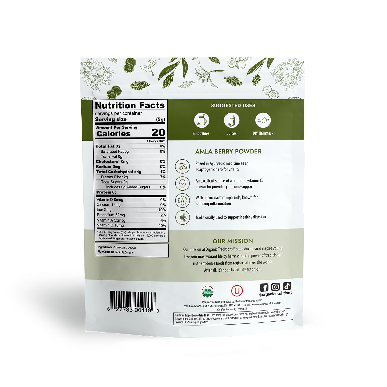 Organic Traditions Amla powder on a kitchen counter with fresh ingredients.