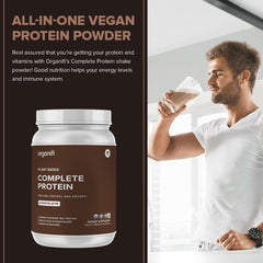 Organifi Complete Protein chocolate shake in glass with creamy texture