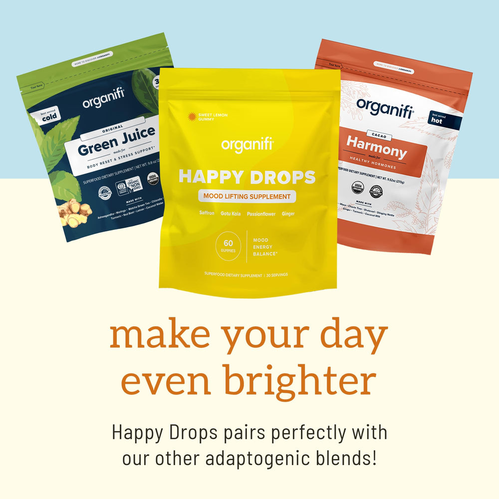 Organifi Happy Drops ingredients scene featuring saffron and botanicals.
